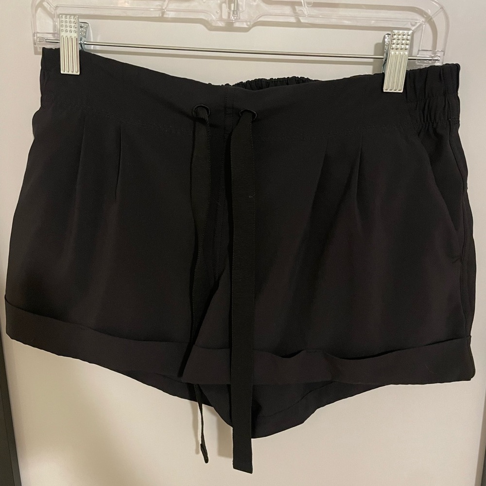 Black lululemon shorts with two pockets and a tie